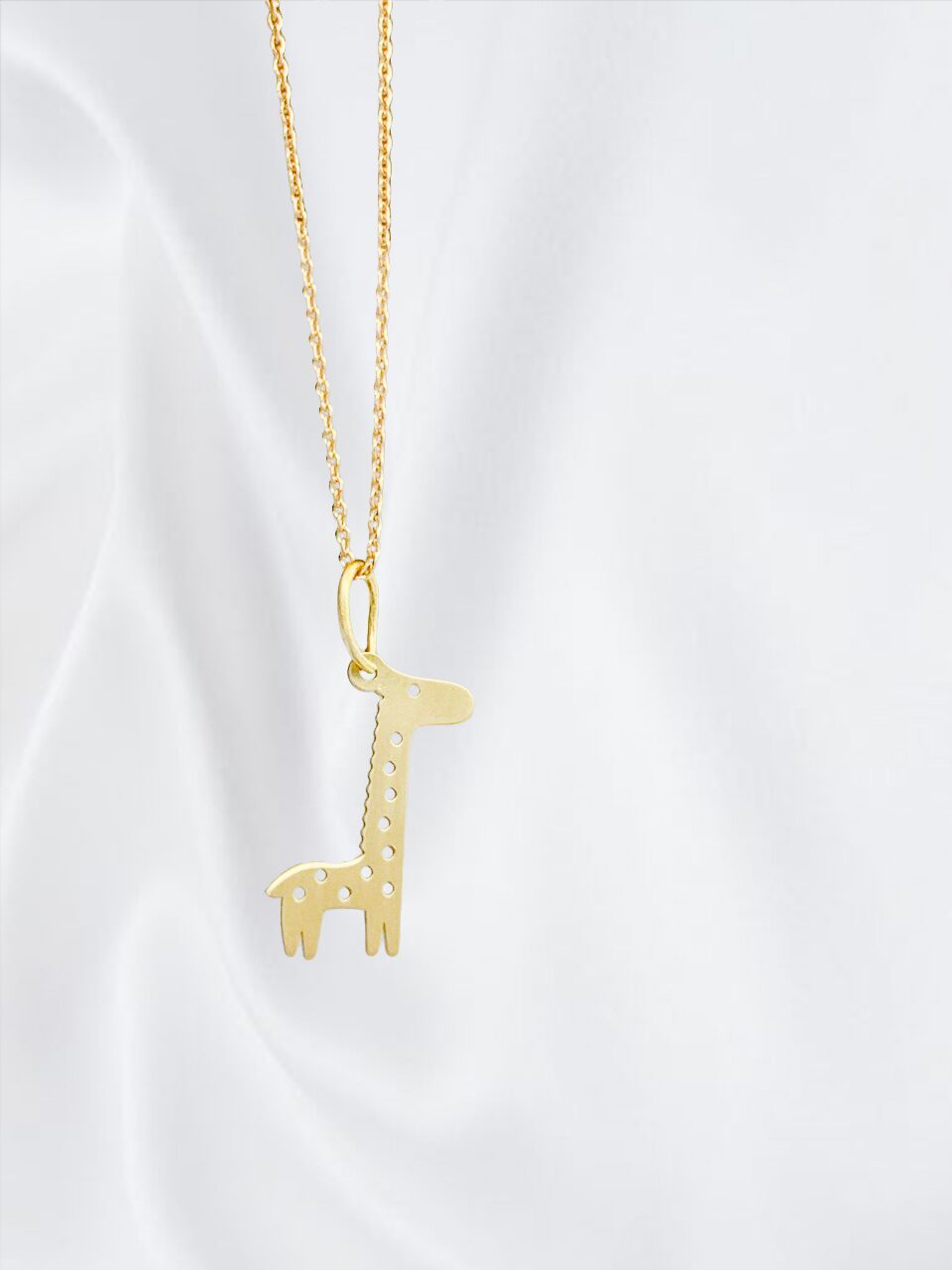 پلاک طلا زرافه بازیگوش